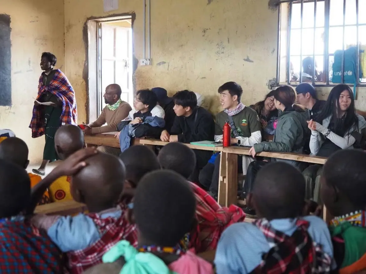 HWF mentors visiting a Maasai community classroom