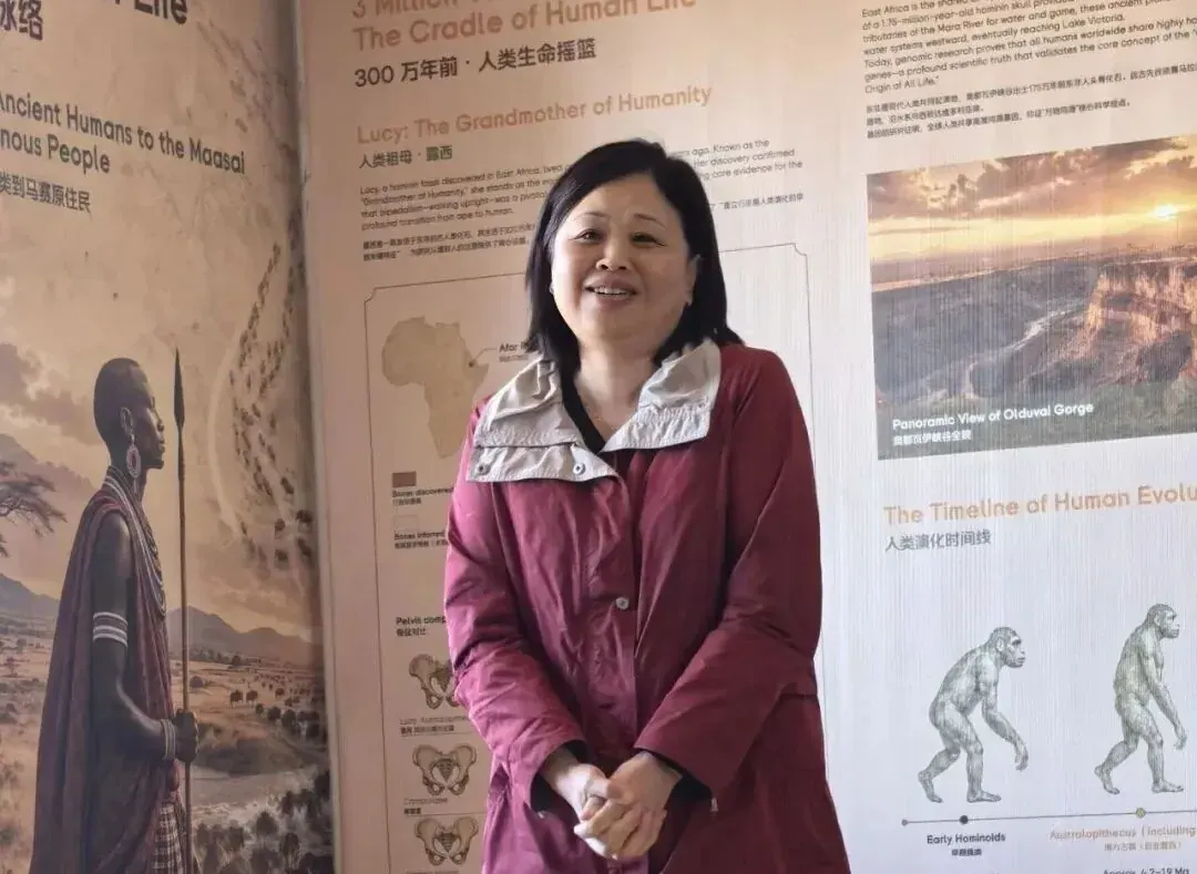 A guest at the exhibit panel